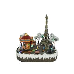 Cena de natal em Paris com luz, música e movimento